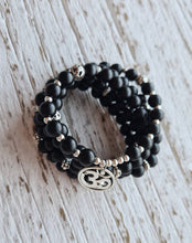 Load image into Gallery viewer, Matte Onyx Om Mala  stretch mala with artisan om charm, black onyx wrap bracelet.