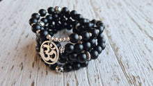 Load image into Gallery viewer, Matte Onyx Om Mala  stretch mala with artisan om charm, black onyx wrap bracelet.