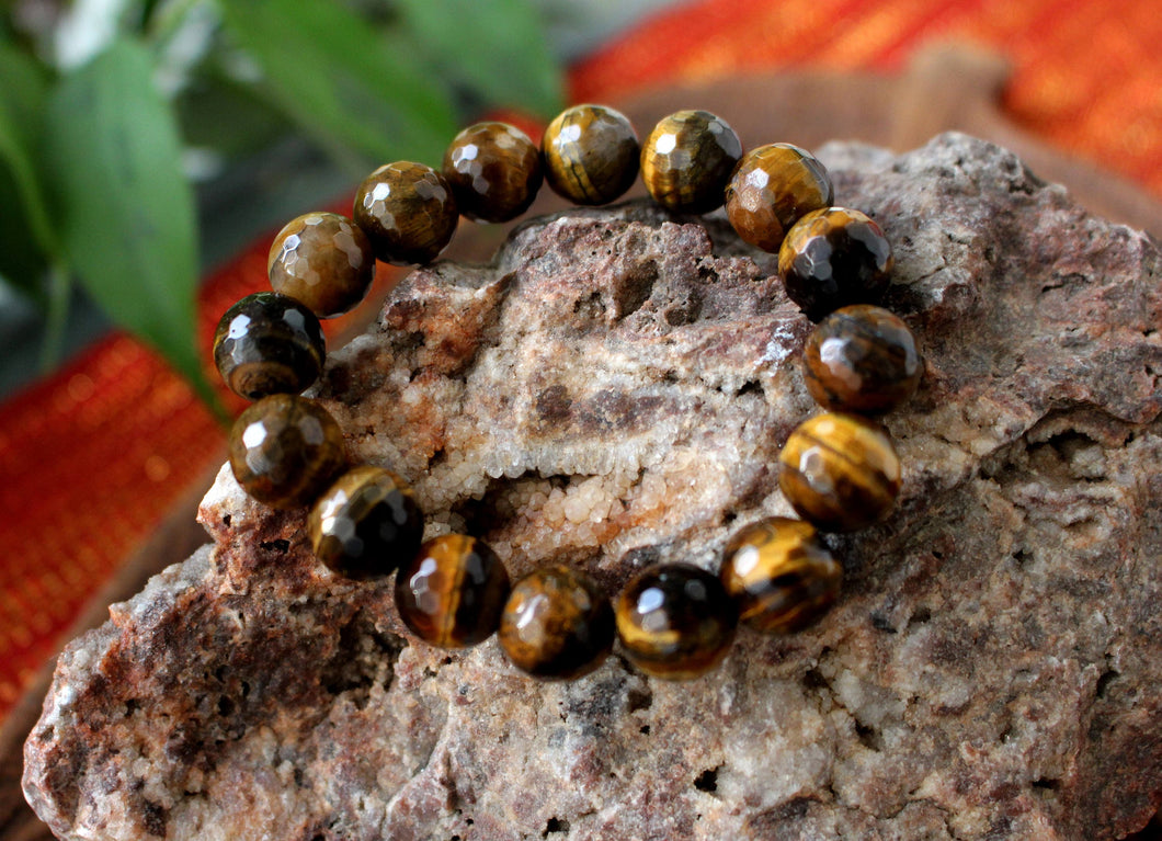 Tiger eye bracelet. High quality 12mm faceted beads.Unisex bracelet. Gift for her and him.