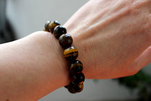 Load image into Gallery viewer, Tiger eye bracelet. High quality 12mm faceted beads.Unisex bracelet. Gift for her and him.
