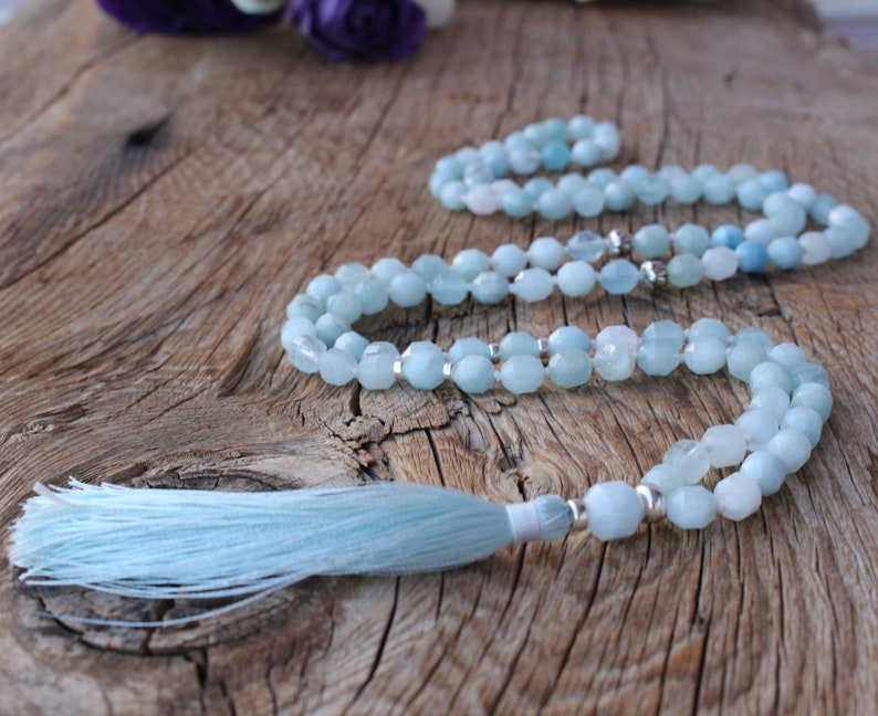 108 Aquamarine AAA grade Mala. Double pointed top quality Aquamarine beads. Sterling Silver Accents. Vegan Silk Handmade Tassel Necklace.