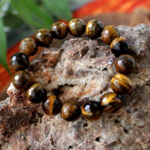 Tiger eye bracelet. High quality 12mm faceted beads.Unisex bracelet. Gift for her and him.